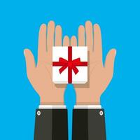 businessman hands holding white gift box with red bow. vector illustration in flat style on green background