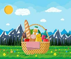 WIcker picnic basket full of products, wine, sausage, bacon and cheese, apple, tomato, cucumber, salad, juice. Grass, flowers, mountains and trees, sky clouds sun Vector illustration in flat style