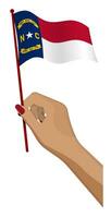 Female hand gently holds small flag of american state of North Carolina. Holiday design element. Cartoon vector on white background