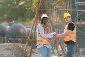 Portrait of architect and engineer with experience in multi-story building construction photo