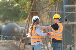 Portrait of architect and engineer with experience in multi-story building construction photo