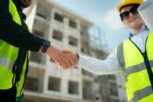 Portrait of architect and engineer with experience in multi-story building construction photo