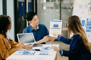 UX developer and ui designer brainstorming about mobile app interface wireframe design with customer breif and color code photo