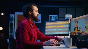 Photographer using photo editing software on PC display in multimedia creative studio while listening to music. Freelancer using photographs retouching program, hearing songs through headphones video