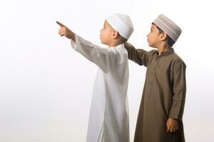 AI generated Two young boys in Arabic attire looking up at the sky. photo