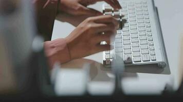 Beautiful female call center operator working on computer in office video