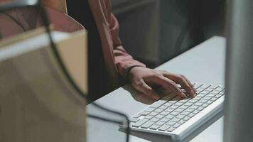 Beautiful female call center operator working on computer in office video