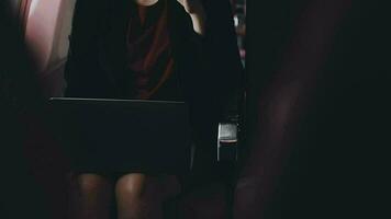 Asian young woman using laptop sitting near windows at first class on airplane during flight,Traveling and Business concept video