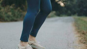 Exercise and healthy concept, Young asian runner woman running in the park in sportswear morning time, selective focus video