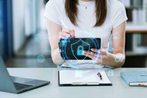 Cybersecurity and privacy concepts to protect data. Lock icon and network security technology. woman protecting personal data on smartphone tablet, virtual photo