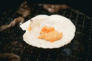 Japanese Kani Miso crabmeat with soybean paste grilled in crab shell at Japanese restaurant. photo