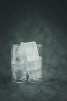 Ice cubes in glass photo