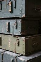 Soviet army ammunition stack of green crates with russian names of ammo type and category photo