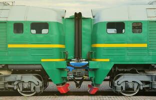 Transition between two electric trains. A small corridor in the role of a portal between the two sides of the cabin of a Russian electric train photo