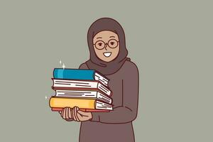 Arab little girl in hijab holds religious books with prayers in hands and looks at screen with smile vector