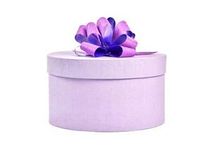 Round gift box with bow, isolated. photo