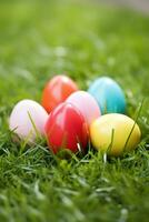 AI generated A close-up shot of colorful Easter eggs arranged on lush green grass photo