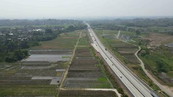 Aerial view of toll road that surrounded by nature in Boyolali, Java , Indonesia video