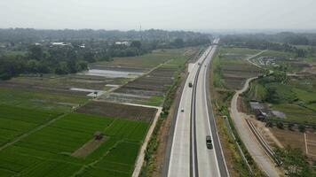 Aerial view of toll road that surrounded by nature in Boyolali, Java , Indonesia video