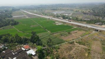 Aerial view of toll road that surrounded by nature in Boyolali, Java , Indonesia video