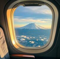 AI generated a view of a mount fuji mountain is seen through the window of an airplane photo