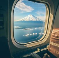 AI generated a view of a mount fuji mountain is seen through the window of an airplane photo