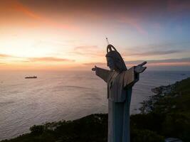 Aerial view of Vung Tau city, Vietnam, panoramic view of the peaceful and beautiful coastal city behind the statue of Christ the King standing on Mount Nho in Vung Tau city. photo