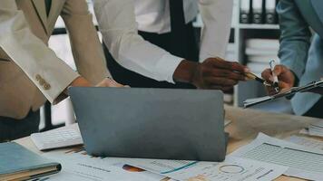 Co working conference, Business team meeting present, investor colleagues discussing new plan financial graph data on office table with laptop and digital tablet, Finance, accounting, investment. video