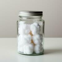 AI generated clear glass jar filled with cotton pads photo