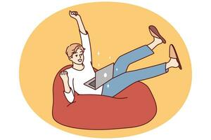 Happy young man sit on sofa triumph win lottery online on computer. Excited guy use laptop feel euphoric with good news online on victory. Vector illustration.