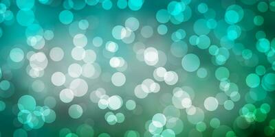 Light Blue, Green vector backdrop with dots.