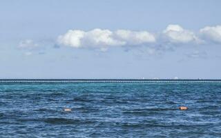 Tropical Caribbean beach clear turquoise water Playa del Carmen Mexico. photo