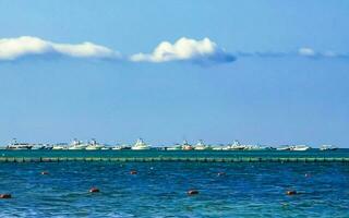 Boats yachts catamaran jetty ships port Playa del Carmen Mexico. photo
