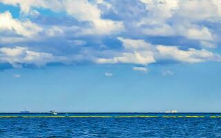 Boats yachts catamaran jetty ferry Playa del Carmen Cozumel Mexico. photo