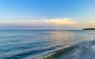 Tropical Caribbean beach clear turquoise water Playa del Carmen Mexico. photo