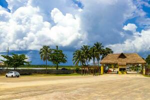 Coba Quintana Roo Mexico 2023 Parking lot stores shops restaurants ticket hut entrance Coba ruins. photo