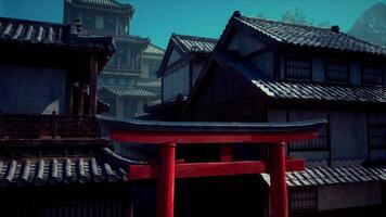 A red gate stands in front of a row of buildings video