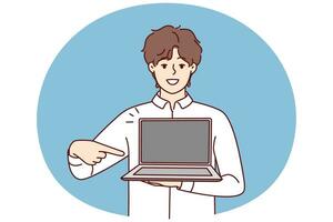 Smiling young man point at modern laptop with mockup screen. Happy male show contemporary computer. Tech and gadget application. Vector illustration.