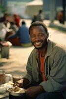 AI generated Smiling black homeless man eating free food in a street canteen photo