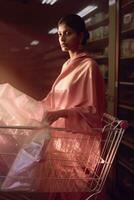 AI generated A woman holding a shopping cart filled with pink items photo