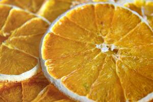 Orange chips, close up. A healthy snack. Fruit chips. photo