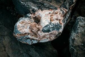 Light gray rock texture concept photo. Mountain rough surface. Close up stone wall background for design. photo