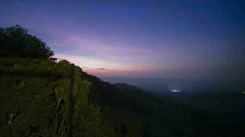 A milkyway star at nigh sky with cloudy on mountain view located at thailand video