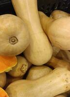 tropical pumpkins at an outdoor farmer's market. pumpkin patch. pumpkins from southeast Asia. photo