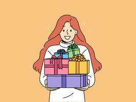 Woman with gift boxes in hands smiles, rejoicing at large number of new year presents from friends vector