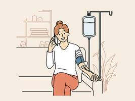 Happy woman receiving dropper with vitamins sitting on couch at home and talking to doctor on phone vector