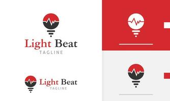 Logo design icon of light bulb lamp with pulse beat outline for hospital health monitor diagnose vector