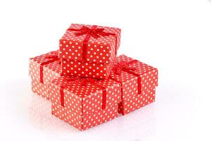 beautiful new year red gift boxes on white background photo