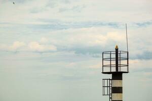 Beautiful view of the sea with borders and view of the lighthouse photo