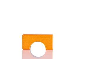 Wooden orange color on a white background photo